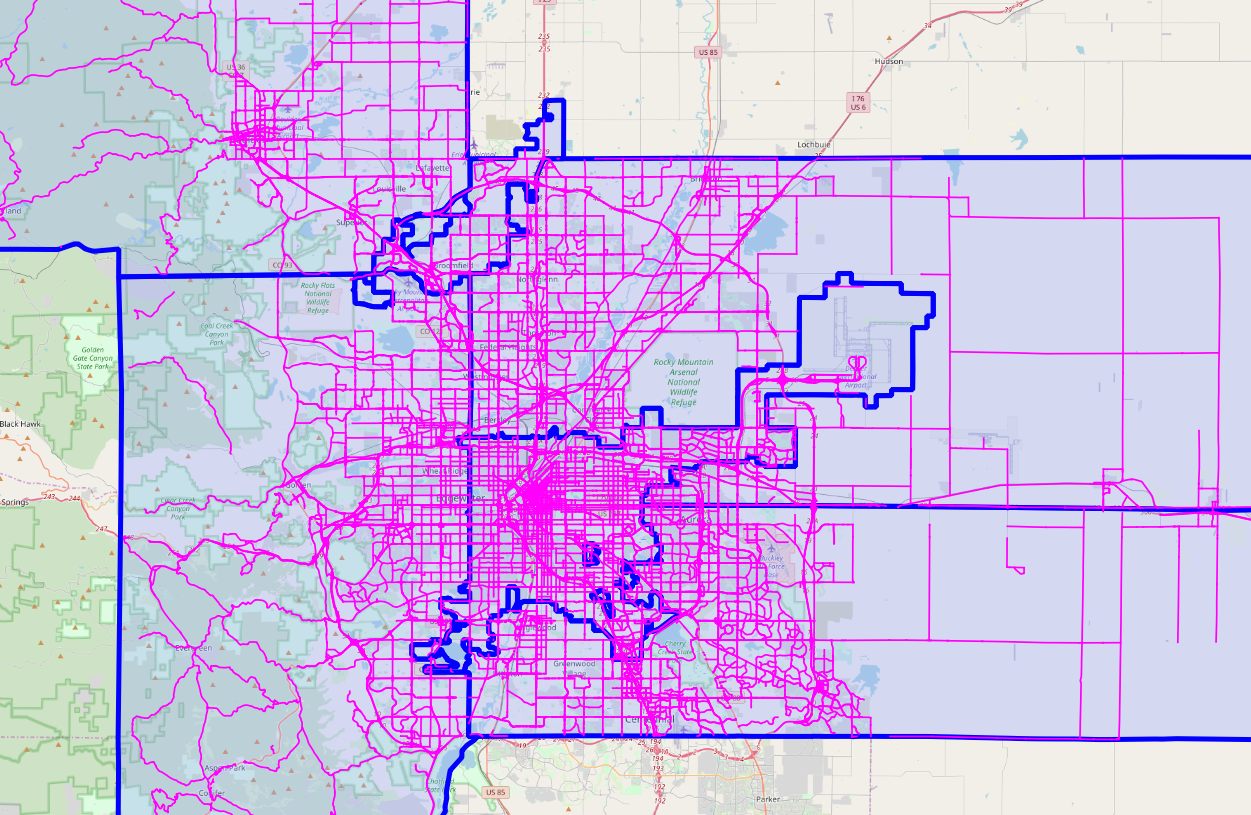 Screenshot from QGIS showing the selected thematic roads as purple lines overlaying the six (6) county polygons.